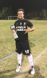 Boom City captain with championship trophy